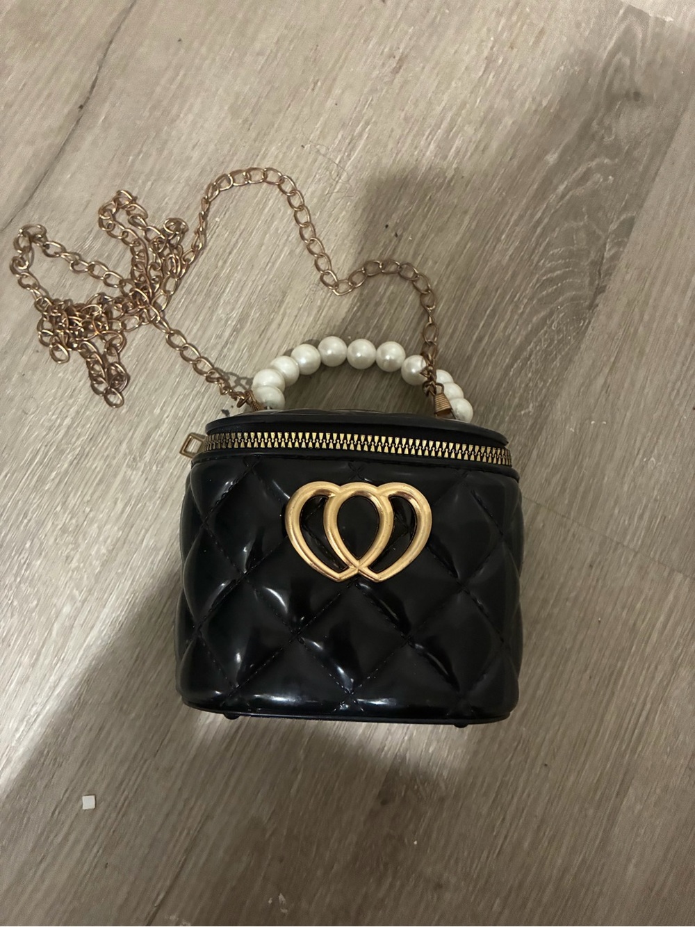 Black Quilted Mini Crossbody Bag with Gold Double-Heart Accent